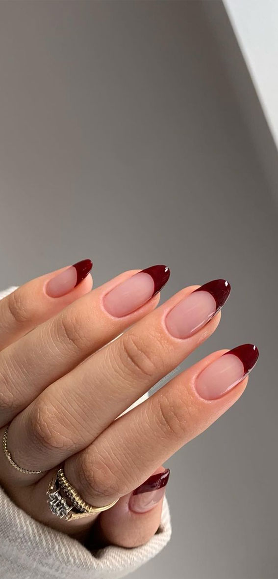 Being Gentle With Maroon Oval Nails