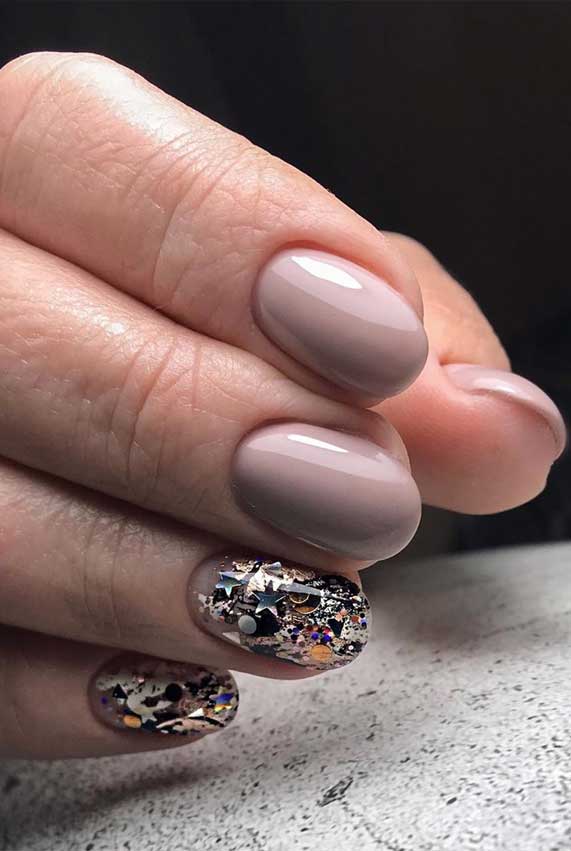 Mismatched Mauve Nails and Glittered nails with stars