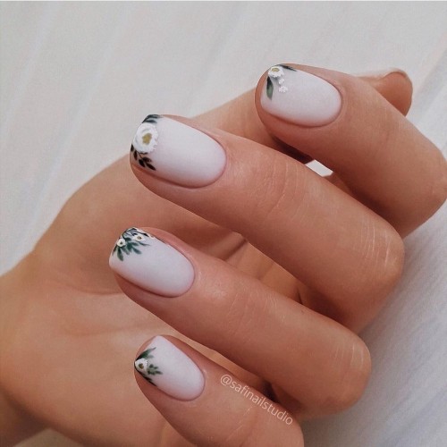 Delicate floral tip white nails