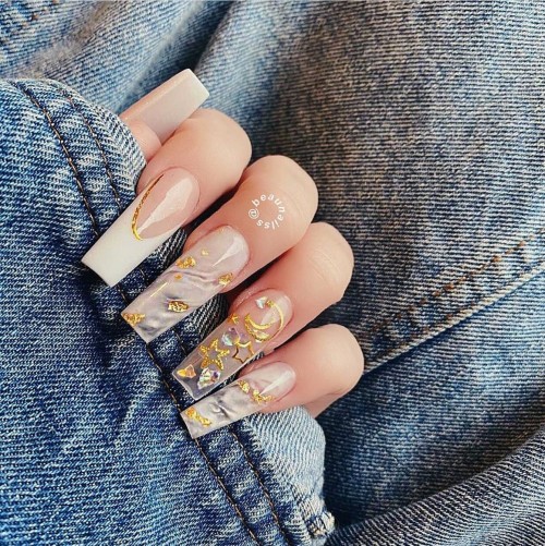 Mix and match gold moon & star, marble and French nails