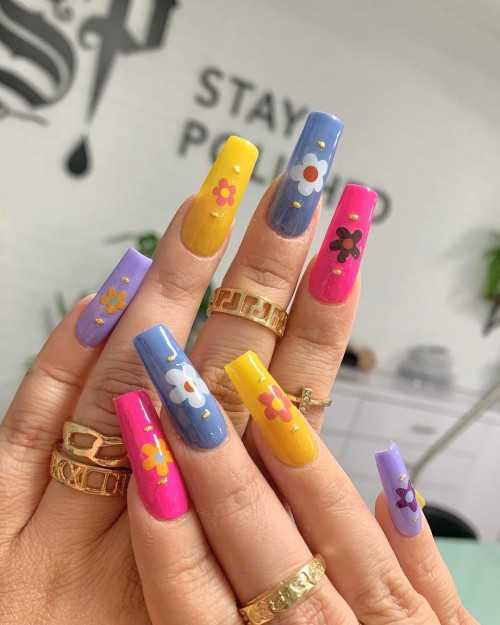 colorful nails with floral accent nails, floral painted colorful nails, bright summer nails 2021, summer nails 2021, bright summer nails 2021, summer nail trends 2021, summer nail art, summer nail polish designs, short summer nails 2021, cute summer nails 2021, short summer nails 2021, best summer nail colors 2021