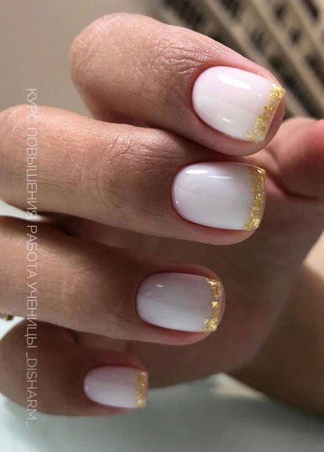 White nails with gold tips