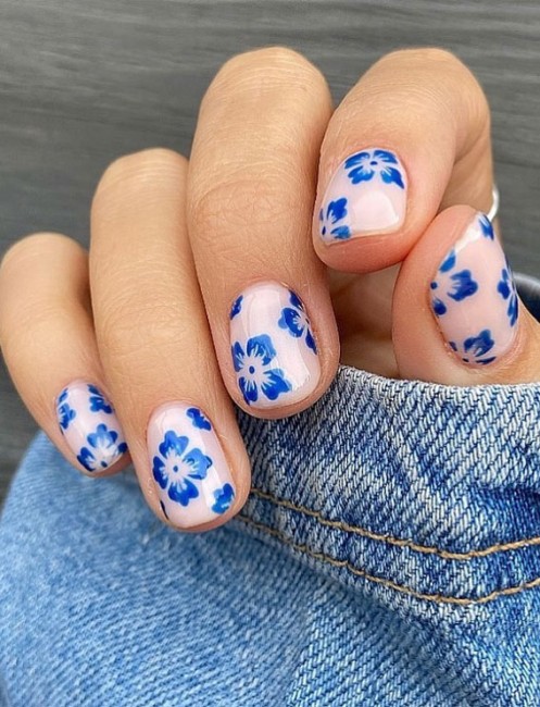 Cute gel nails with blue flower accent nails