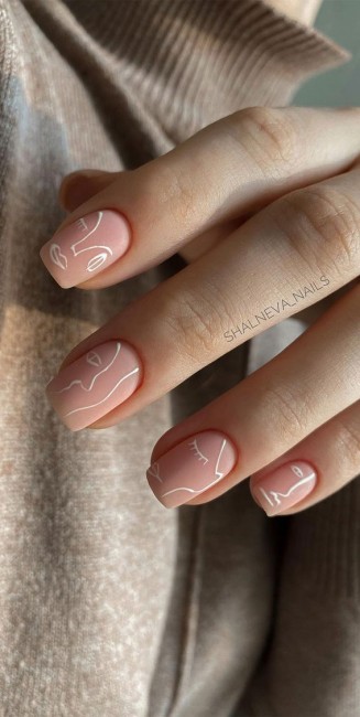 White abstract face matte nails