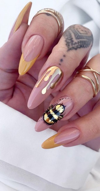 colored french tip nails, colored tips nails, gold tip nails, summer nail art designs, bee nails, gold drip nails, gold french tip nails, almond-shaped nails