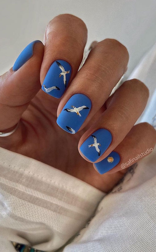 Beach vibe nails – Cobalt blue seagull nails