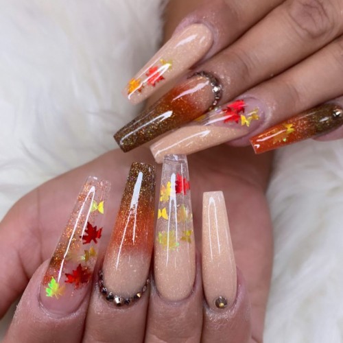 clear nails, fall nail art designs, fall nails, fall nail designs, fall nails 2021, encapsulated fall leaf nails, clear nails fall leaf, fall decal nails, mix and match fall nail art ideas, coffin nails