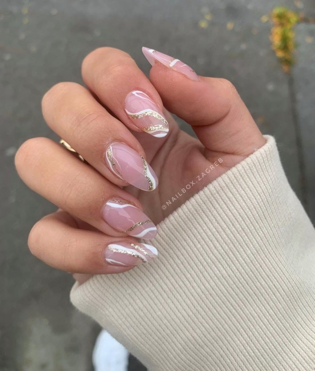 nude nails, nude nails with glitter, nude nail designs 2021, nude and white nail designs, short nude nails, neutral color nail designs, long nude nails, neutral nail designs 2021, nude acrylic nails, nude and silver nails, nude nails with diamonds, nude nails with design, beige nails with glitter