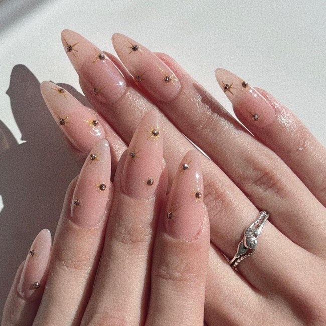 65 Stylish Ways To Wear Nude Nails —  Gold Starburst Sheer Nude Nails