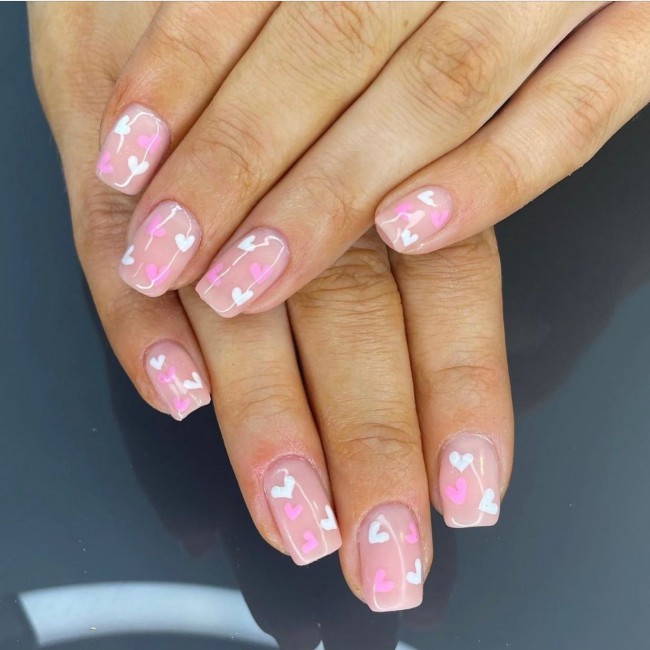 valentine's day nails 2022, valentine nails, pink love heart nails, cute love heart nails, valentine nails 2022, heart nails 2022, heart tip nails, heart nails brown, red nails, pink nails 2022