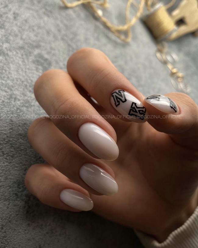 nude nails with design, initial letter nails, nude nails 2022