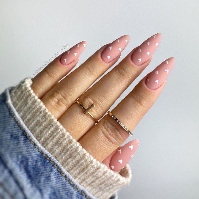 matte nude nails with love hearts, valentines day nails 2022, simple heart nails