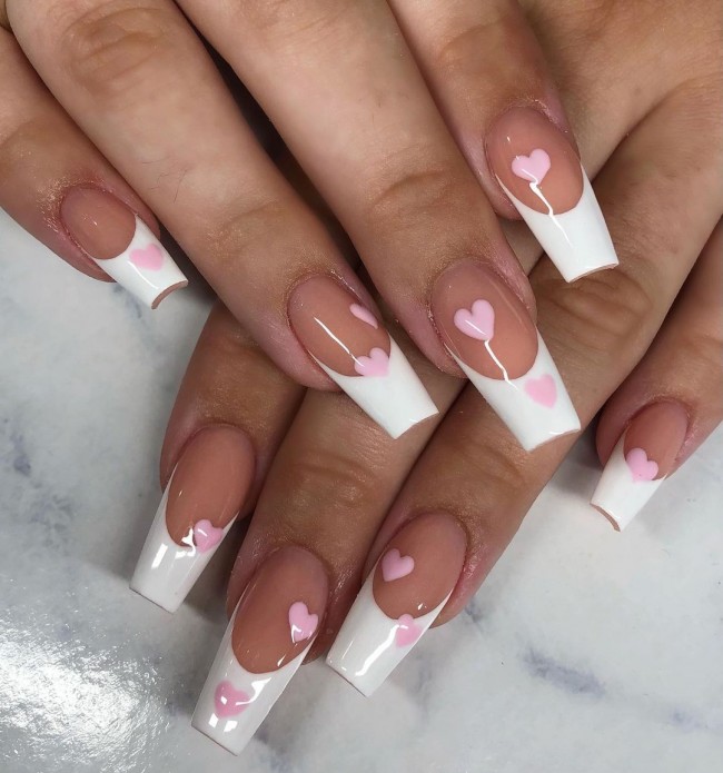 25 Cute Valentine’s Day Nail Designs 2022 : White French with red hearts Nails