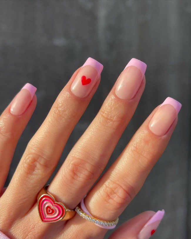 red heart baby pink french nails, gel nails, heart tip nails, love heart nails, heart tip nails pink, white heart nails, valentine's day nails 2022, pink heart valentine nails, valentine nail designa, valentine's day nail tips, valentines nails, red heart nails, pink heart nails