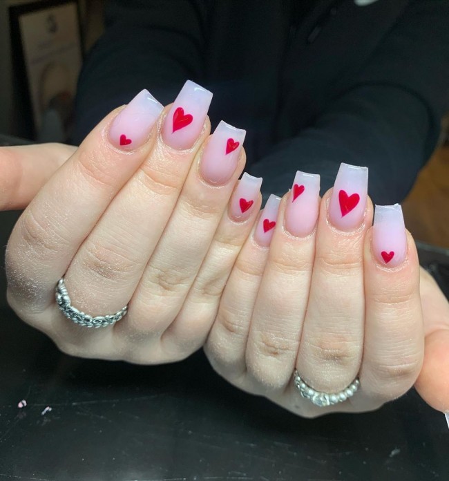 24 Charming Valentine’s Day Nail Ideas : Neutral Nails with Red Hearts