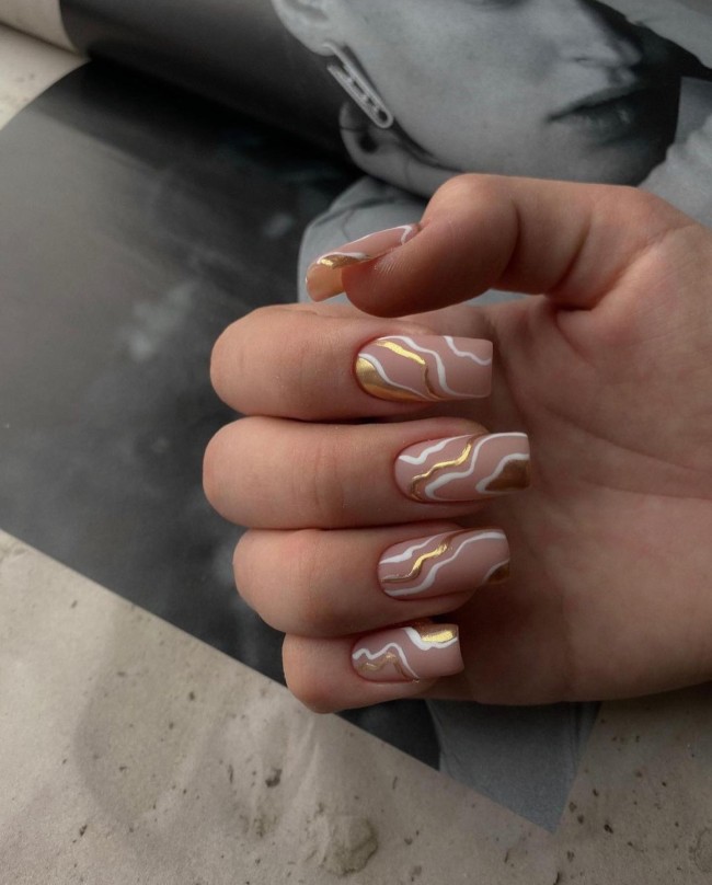 50 Spring Nail Designs 2022 — Gold and White Swirl Nude Nails