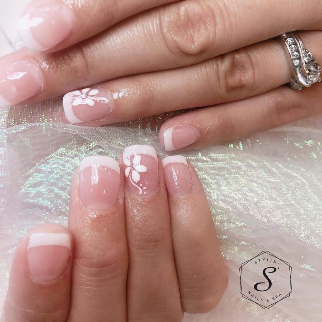 40+ Trendy Flower nail designs 2022 — Classic French with White Floral Design