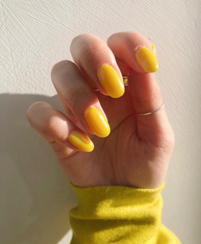 30 Yellow Nail Designs To Spice Up Your Day — Simple Yellow Oval-Shaped Nails