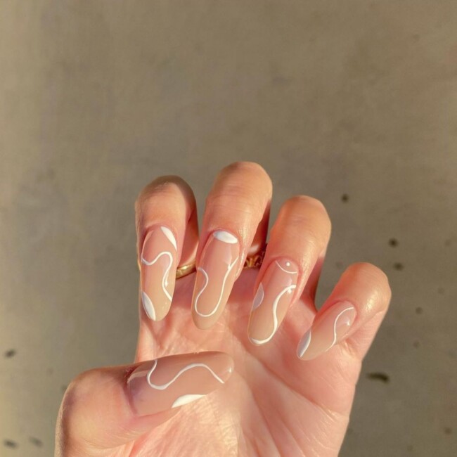 57 Trendy Almond Nails for Spring 2022 — White Swirl Nude Nails