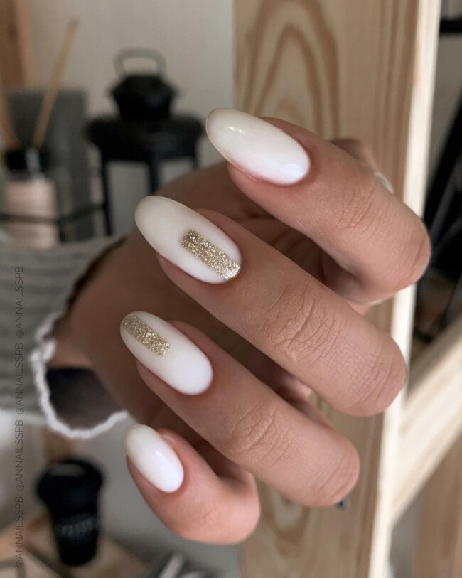 40 Best Wedding Nails For 2022 : Milky White Nails with Glitter Gold Accents