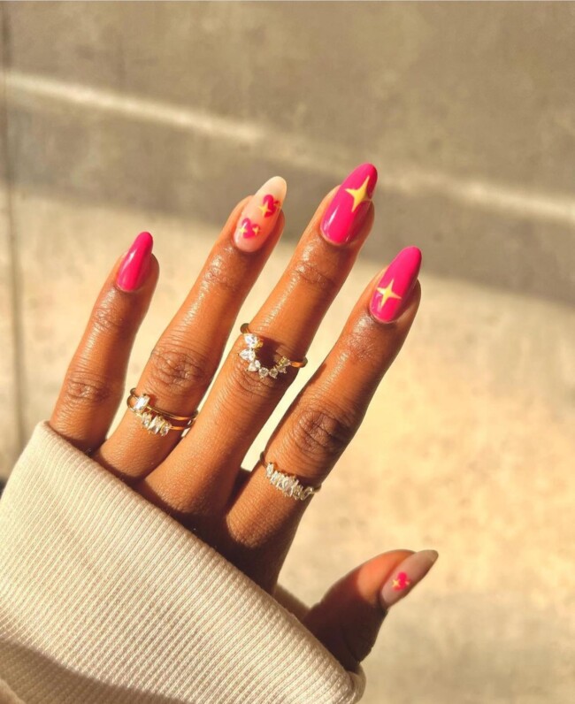 44 Trendy Pink Nails For Every Outfit — Hot Pink Almond Nail Art with Yellow Sparkles