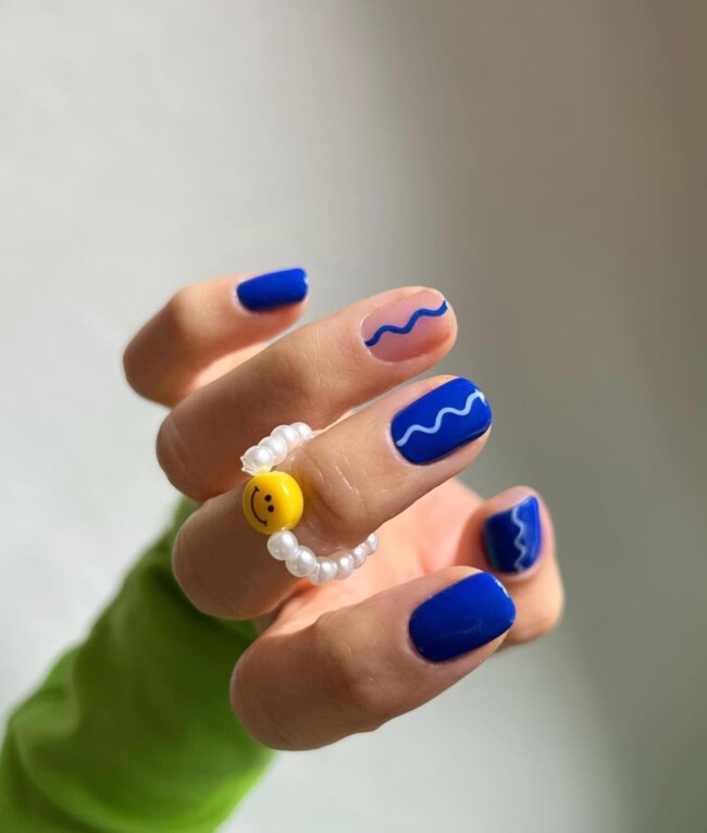 27 Best Summer Nail Colors — Dark Blue Nails with Blue Swirl