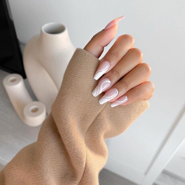 40 Nude Nail Designs For Any Occasion — White Swirl Nude Nails