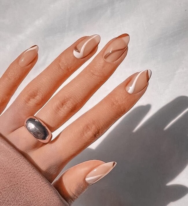 40 Nude Nail Designs For Any Occasion — Brown and White Swirl Almond Nails