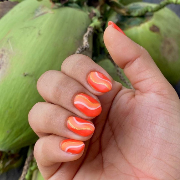 34 Bright Summer Nails — Orange and White Swirl Nails