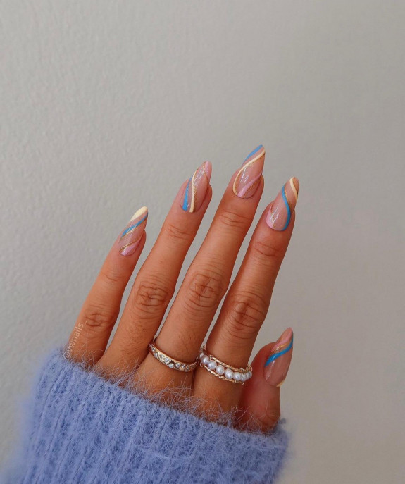 40+ Trendy Summer Almond Nail Designs — Buttercup and Blue Swirl Sheer Nails