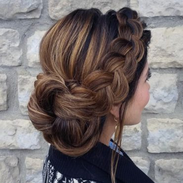 french-braided bun chignon, braided bun with weaves, braided ballerina bun, braided bun with bangs, easy braid bun hairstyles, cute braided bun hairstyles, braids with a bun on top, braided bun hairstyles for black hair, wedding hairstyle, bridal braided bun, wedding braided bun hairstyleVoluminous classic braided bun wedding hairstyle on medium-length ha