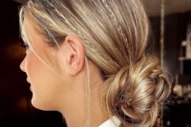 Micro braided bun hairstyle with sleek finish and low twisted bun – elegant bridal look