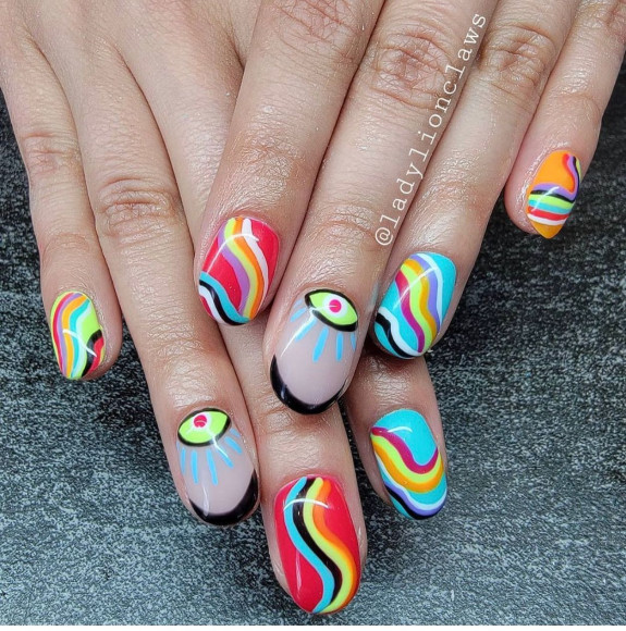 psychedelic nail art, mushroom nails, 70s nail art design, 1960s nail trends, hippie nails, swirl nails, 70s-inspired nails, summer nails, summer nails 2022, drippy nails, hippie nails 2022, swirl nail designs, 1960 nail trends, trippy nails