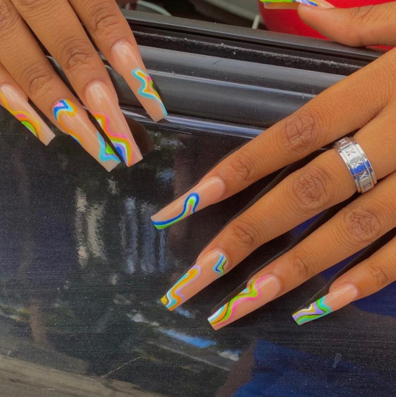 psychedelic nail art, mushroom nails, 70s nail art design, 1960s nail trends, hippie nails, swirl nails, 70s-inspired nails, summer nails, summer nails 2022, drippy nails, hippie nails 2022, swirl nail designs, 1960 nail trends, trippy nails