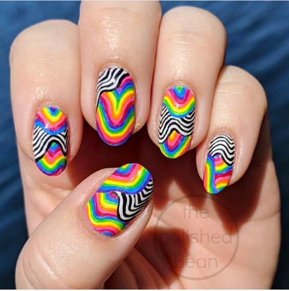 psychedelic nail art, mushroom nails, 70s nail art design, 1960s nail trends, hippie nails, swirl nails, 70s-inspired nails, summer nails, summer nails 2022, drippy nails, hippie nails 2022, swirl nail designs, 1960 nail trends, trippy nails