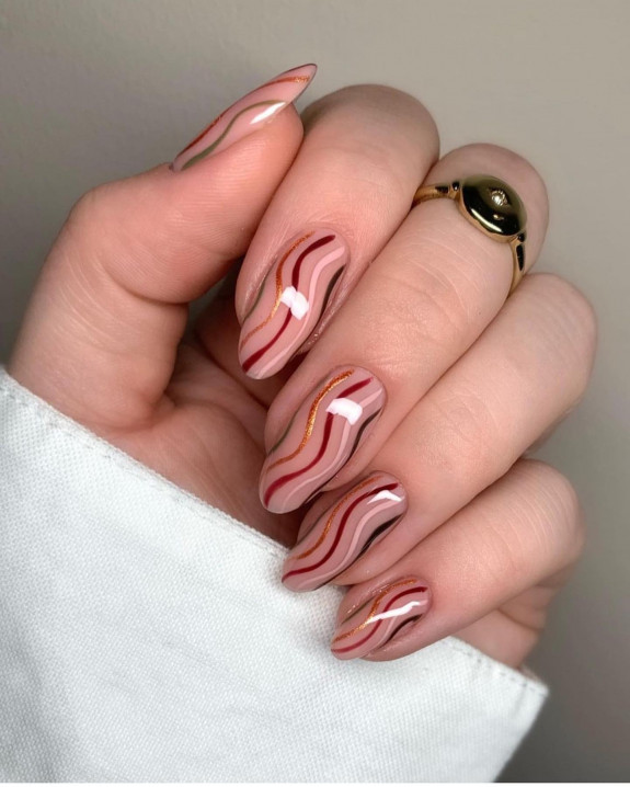 40 Nail Designs For Fall 2022 — Brown and Glitter Swirl Sheer Nails