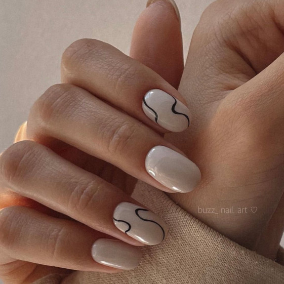 30 Pretty Fall Nail Designs in 2022 — Neutral Round Nails with Black Swirl