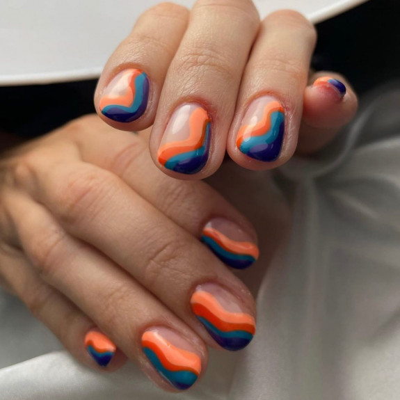 30 Pretty Fall Nail Designs in 2022 — Blue and Orange Swirl Short Nails