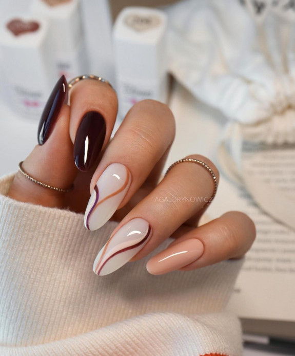 25 Autumnal Nails in 2022 — Earthy Brown Swirl Almond Nails