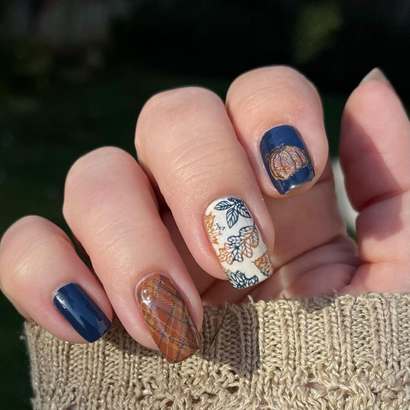 40+ Thanksgiving Nail Ideas — Navy Blue Nails with Pumpkin Accents