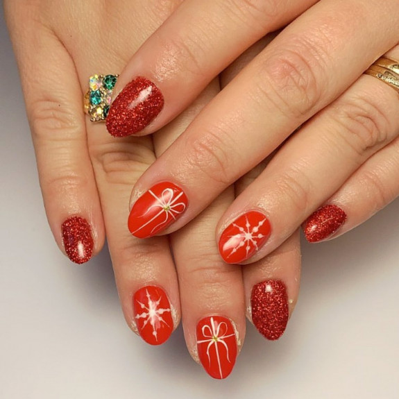 red santa nails,  red santa hat nails, red nails with  snowflakes, red glitter nails, red french tip nails, acrylic red nails, red festive nails, red christmas nails, christmas nails, red holiday nails, red christmas nail ideas, red christmas nail designs, red nails