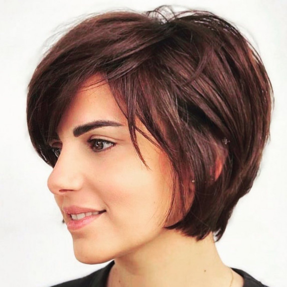 Dark brown bixie haircut with fringe