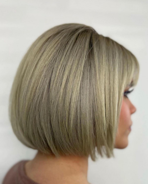 Dark blonde bob with fringe