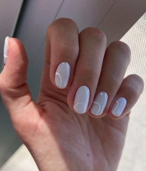 30 Cute Short Nail Ideas To Wear In 2023  — Milky Nails with White Swirl