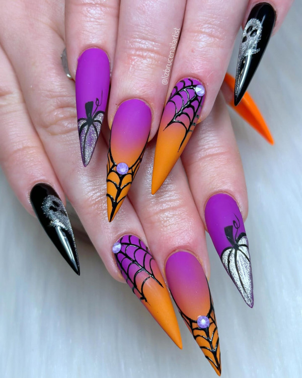 40 Hauntingly Beautiful Halloween Nail Ideas : Spooky Sunset Glam Stiletto Nails