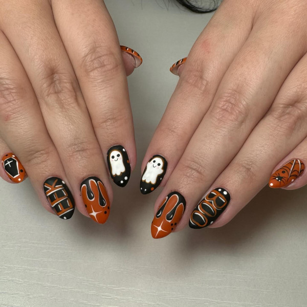 40 Hauntingly Beautiful Halloween Nail Ideas : Boo-tiful Orange & Black Halloween Vibes