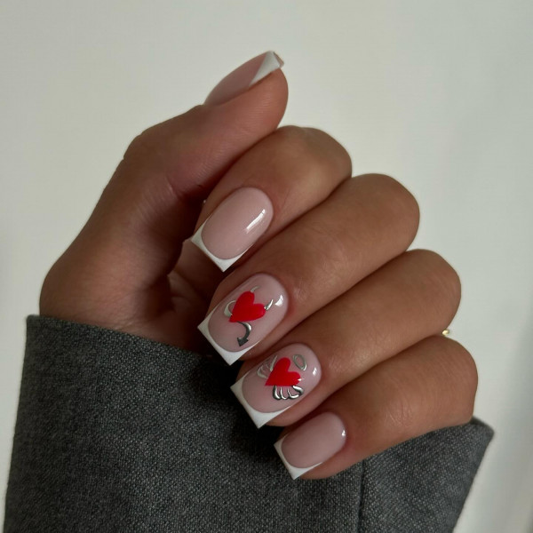 Elegant French Tips with Heart Accents for Valentine's Day, simple valentine's day nails, Best Valentine's Day Nails ideas, Valentine's Nails, Valentine nails, Valentine's day nails, cute Valentine's nail art