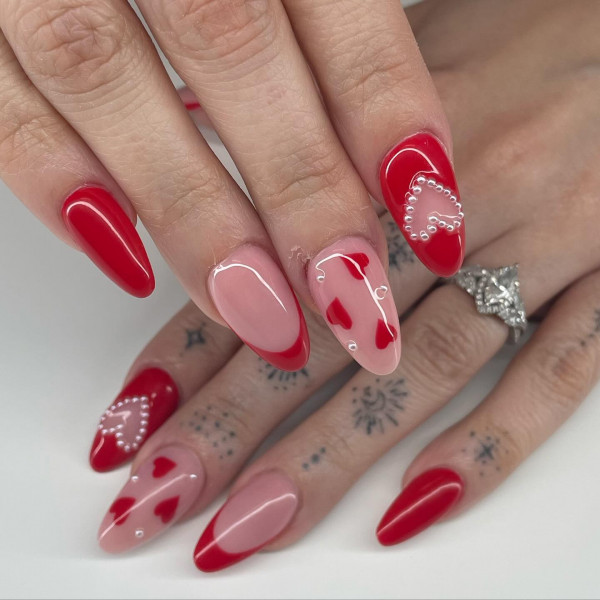 Bold Red Almond-Shaped Nails with Red Tips & Heart Accents, Best Valentine's Day Nails ideas, Valentine's Nails, Valentine nails, Valentine's day nails, cute Valentine's nail art