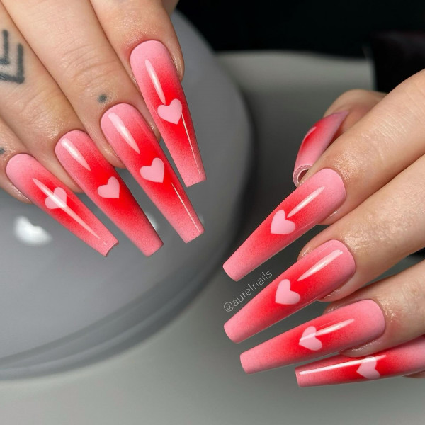 100 Best Valentine’s Day Nails ideas : Vibrant Valentine’s Day Coffin Nails with Heart Accents