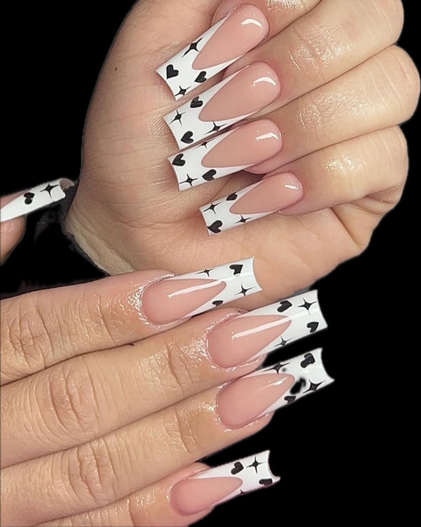 100 Best Valentine’s Day Nails ideas : White V-French Tip Nails with Black Hearts